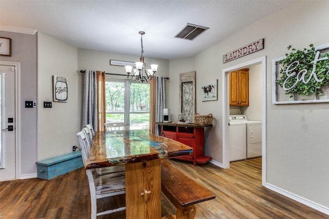 412 Paradise Canyon Cir, Paradise, TX 76073 - dining area with washer and clothes dryer, a chandelier, and wood finished floors
