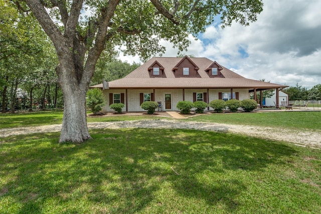 412 Paradise Canyon Cir, Paradise, TX 76073 - country-style home featuring a front yard, a porch, and brick siding