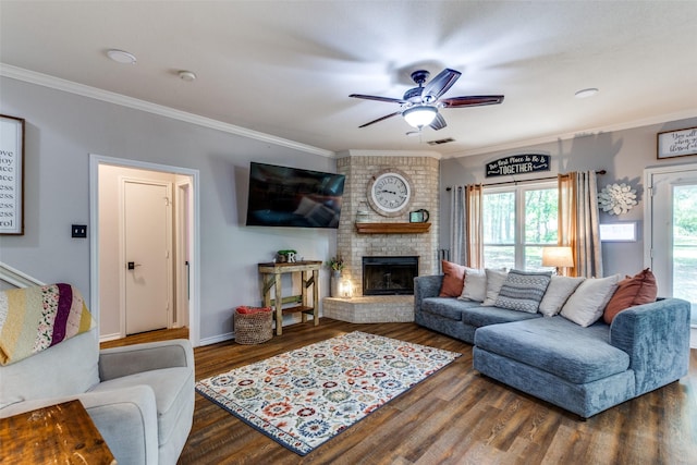 412 Paradise Canyon Cir, Paradise, TX 76073 - living room with ceiling fan, a brick fireplace, ornamental molding, and wood finished floors