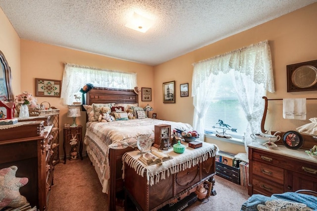 12869 Fm 1385, Pilot Point, TX 76258 - bedroom with light carpet and a textured ceiling