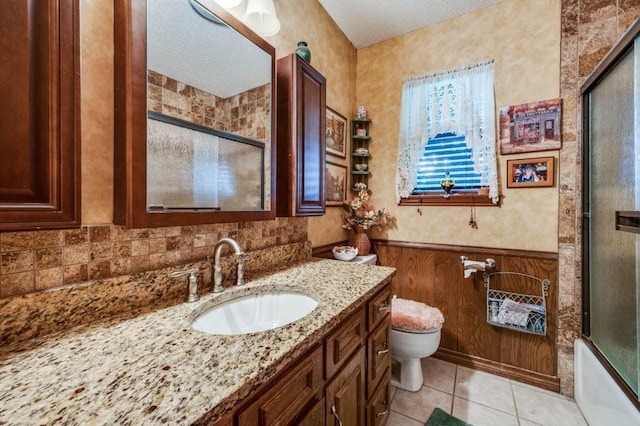 12869 Fm 1385, Pilot Point, TX 76258 - full bath featuring vanity, tile patterned flooring, and enclosed tub / shower combo