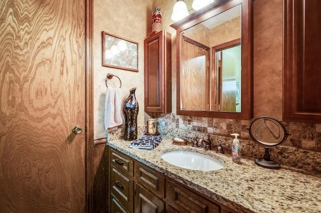 12869 Fm 1385, Pilot Point, TX 76258 - bathroom with vanity and tasteful backsplash