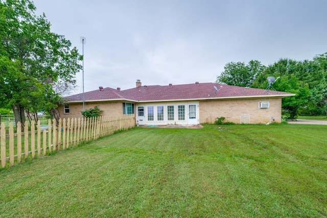 12869 Fm 1385, Pilot Point, TX 76258 - back of house with a wall mounted AC and brick siding