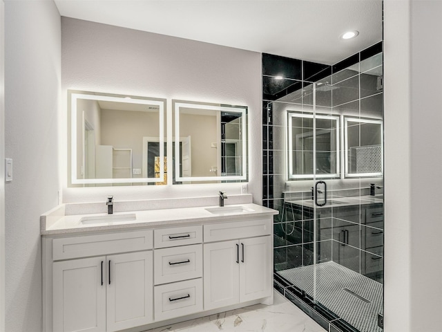 2610 S Ewing Ave, Dallas, TX 75216 - bathroom with marble look tile flooring, double vanity, a shower stall, and recessed lighting