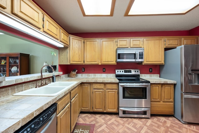 4009 Bradley Ln, Arlington, TX 76017 - kitchen featuring stainless steel appliances and a sink