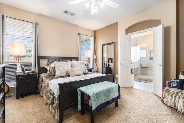12953 Hurricane Ln, Fort Worth, TX 76244 - bedroom with light colored carpet, ensuite bathroom, and ceiling fan