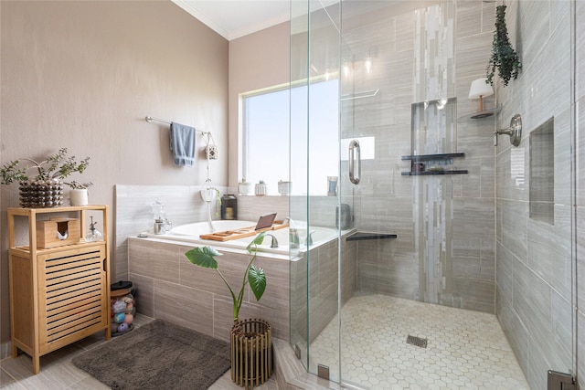 12953 Hurricane Ln, Fort Worth, TX 76244 - bathroom featuring a garden tub, crown molding, a stall shower, and tile patterned floors