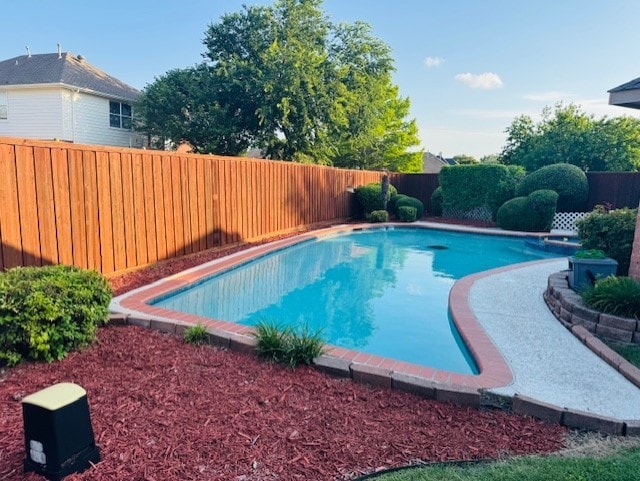 2322 Greenfield Cir, Garland, TX 75040 - view of swimming pool with a fenced backyard