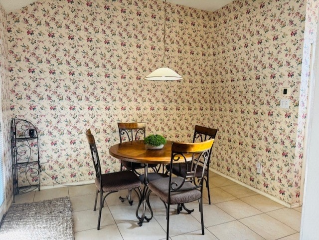 2322 Greenfield Cir, Garland, TX 75040 - tiled dining space with wallpapered walls and baseboards