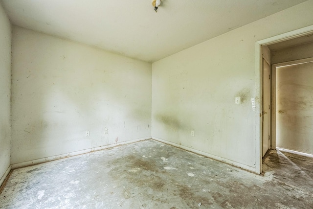 207 N 1st St, Crandall, TX 75114 - unfurnished room with baseboards and concrete floors