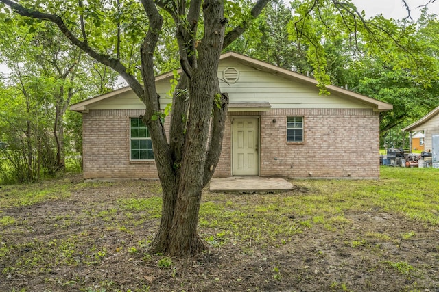 207 N 1st St, Crandall, TX 75114 - view of front of home with brick siding