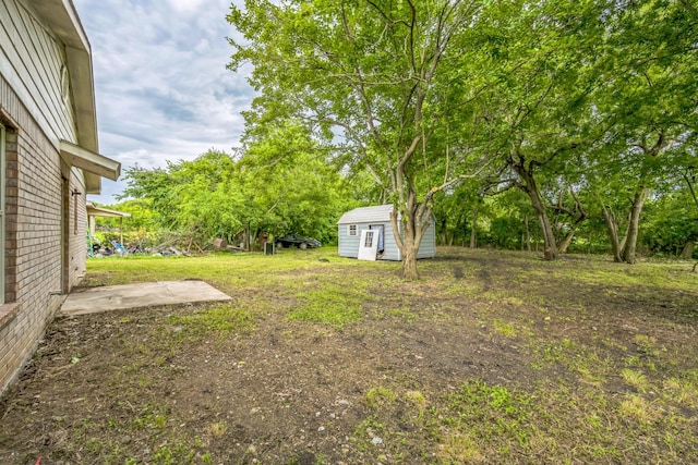207 N 1st St, Crandall, TX 75114 - view of yard with a storage shed