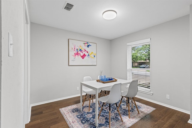 6767 Winifred Dr, Fort Worth, TX 76133 - dining space featuring baseboards and dark wood-style flooring