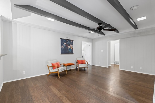 6767 Winifred Dr, Fort Worth, TX 76133 - living area with beamed ceiling, wood finished floors, and ceiling fan