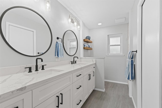 6767 Winifred Dr, Fort Worth, TX 76133 - full bath featuring double vanity, wood finished floors, and recessed lighting