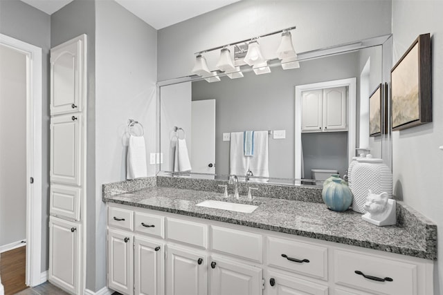 6767 Winifred Dr, Fort Worth, TX 76133 - bathroom featuring vanity and toilet