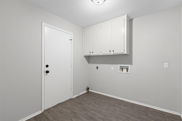 6767 Winifred Dr, Fort Worth, TX 76133 - laundry area featuring electric dryer hookup, cabinet space, washer hookup, and dark wood finished floors