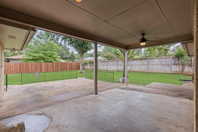 6767 Winifred Dr, Fort Worth, TX 76133 - fenced backyard featuring ceiling fan and a patio