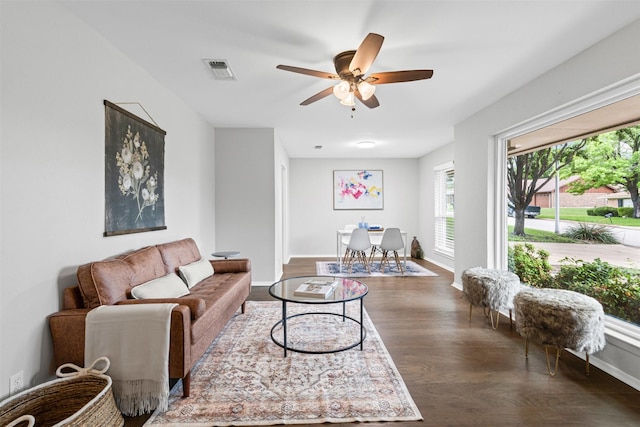 6767 Winifred Dr, Fort Worth, TX 76133 - living area with wood finished floors and ceiling fan