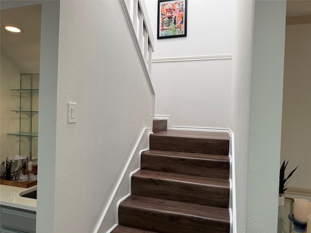 2761 Stonecreek Dr, Carrollton, TX 75006 - stairs featuring recessed lighting