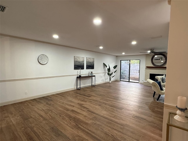 2761 Stonecreek Dr, Carrollton, TX 75006 - exercise area featuring recessed lighting, wood finished floors, a large fireplace, and a ceiling fan