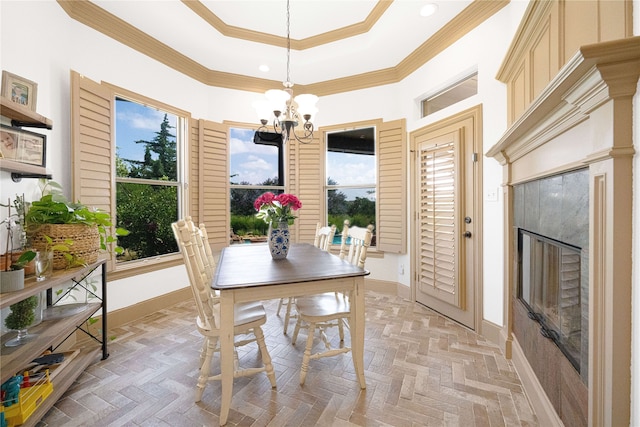 105 Lavender Pl, Mclendon Chisholm, TX 75032 - dining room featuring a chandelier, a tray ceiling, ornamental molding, recessed lighting, and a towering ceiling
