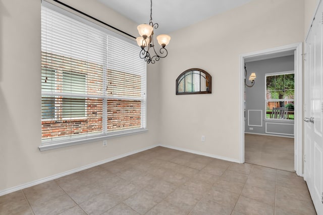 1651 Meadows Ave, Lantana, TX 76226 - unfurnished room featuring a chandelier and healthy amount of natural light