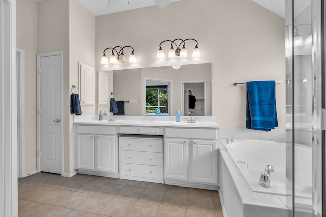 1651 Meadows Ave, Lantana, TX 76226 - bathroom with double vanity, tile patterned flooring, and a bath