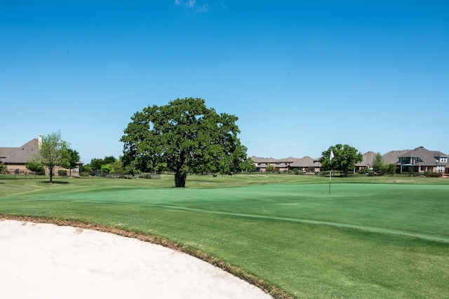 1651 Meadows Ave, Lantana, TX 76226 - surrounding community featuring a residential view, a yard, and golf course view