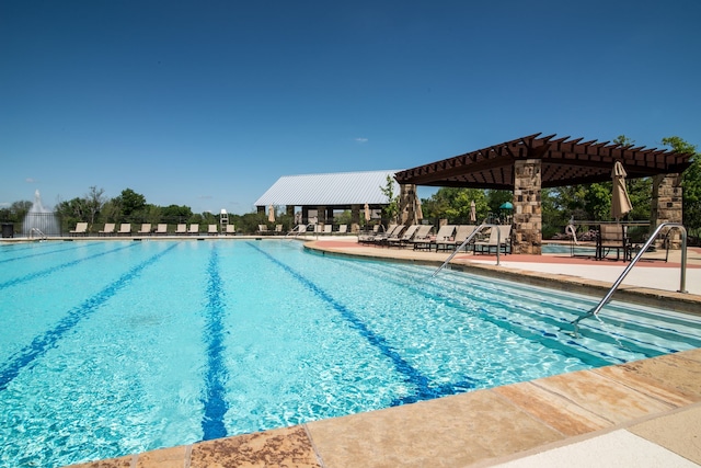 1651 Meadows Ave, Lantana, TX 76226 - community pool with a pergola and a patio area