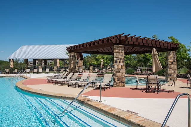 1651 Meadows Ave, Lantana, TX 76226 - community pool with a pergola and a patio area