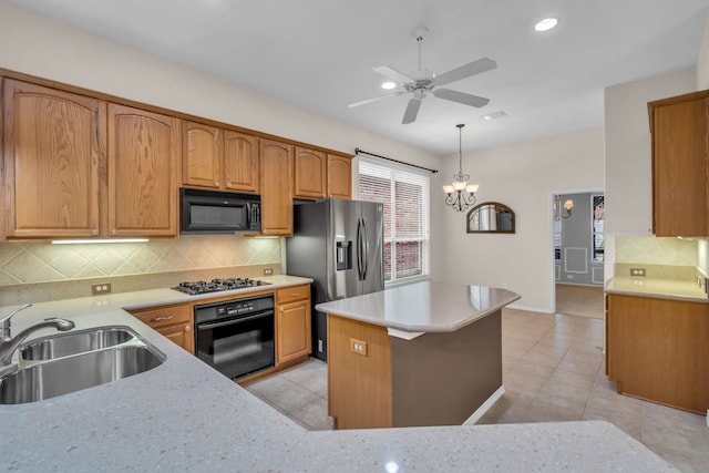 1651 Meadows Ave, Lantana, TX 76226 - kitchen featuring black appliances, a ceiling fan, backsplash, light tile patterned floors, and a center island