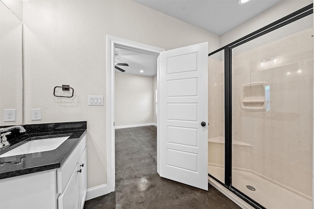 5500 Black Horse, Waco, TX 76708 - full bathroom with concrete floors, vanity, a stall shower, a ceiling fan, and recessed lighting