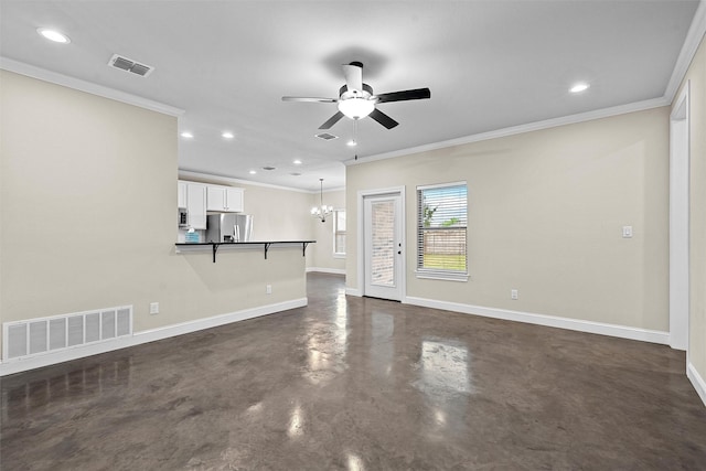 5500 Black Horse, Waco, TX 76708 - unfurnished living room featuring finished concrete floors, a ceiling fan, crown molding, a chandelier, and recessed lighting