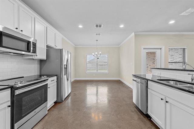 5500 Black Horse, Waco, TX 76708 - kitchen featuring stainless steel appliances, concrete flooring, tasteful backsplash, a chandelier, and ornamental molding