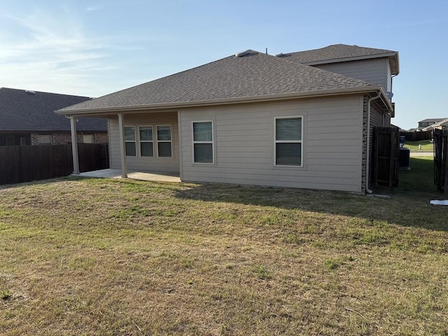 312 Wagon Wheel Dr, Josephine, TX 75189 - back of property with a patio and a shingled roof