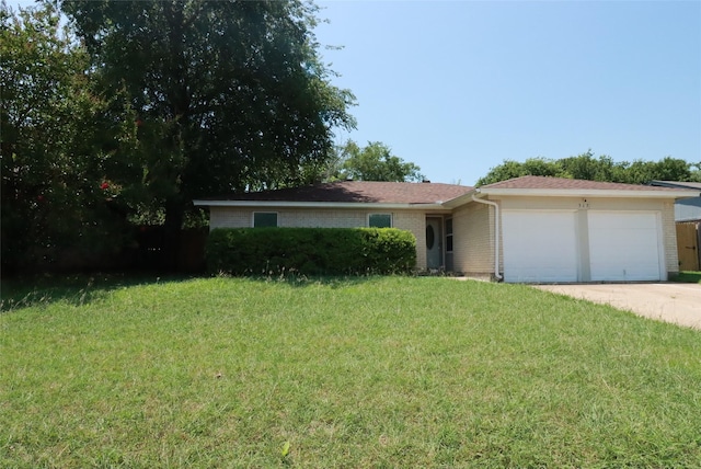 517 Annapolis Dr, Fort Worth, TX 76108 - ranch-style house featuring an attached garage, a front lawn, brick siding, and driveway