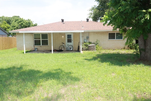 517 Annapolis Dr, Fort Worth, TX 76108 - back of property with brick siding and roof with shingles