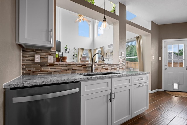 8534 Pebblebrook Dr, Frisco, TX 75034 - kitchen with dishwasher, tasteful backsplash, and plenty of natural light