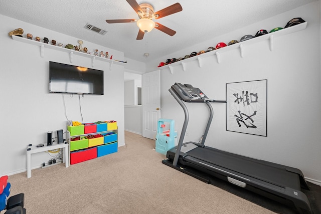 8534 Pebblebrook Dr, Frisco, TX 75034 - workout room featuring ceiling fan and carpet flooring