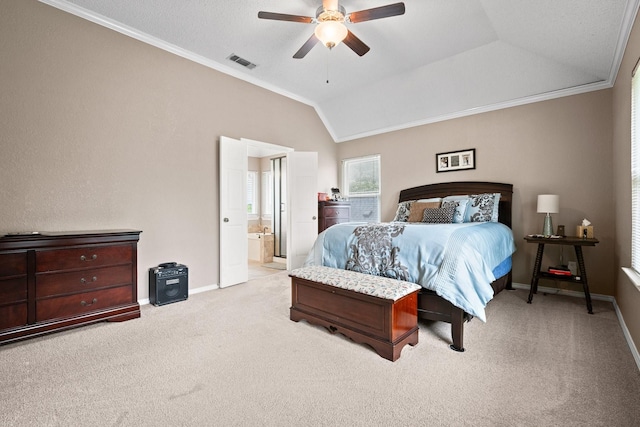 8534 Pebblebrook Dr, Frisco, TX 75034 - bedroom featuring crown molding, light carpet, lofted ceiling, ceiling fan, and ensuite bath