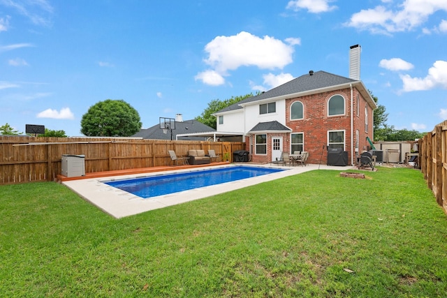 8534 Pebblebrook Dr, Frisco, TX 75034 - view of pool with a fenced backyard, a patio area, a storage shed, and an outdoor hangout area