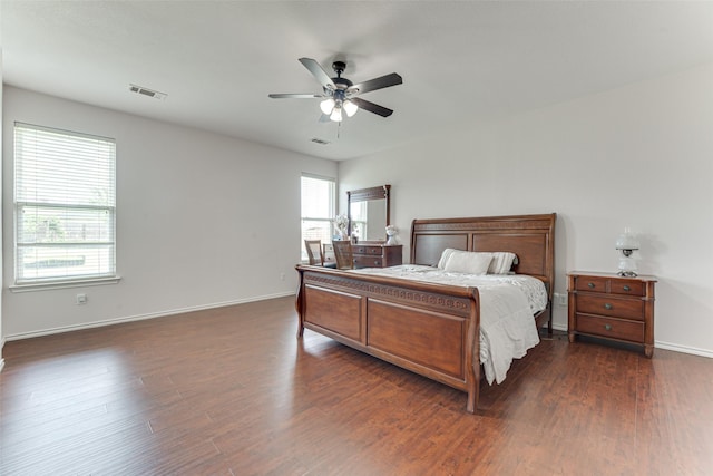 511 Poplar Vista Ln, Arlington, TX 76002 - bedroom with dark wood finished floors and a ceiling fan