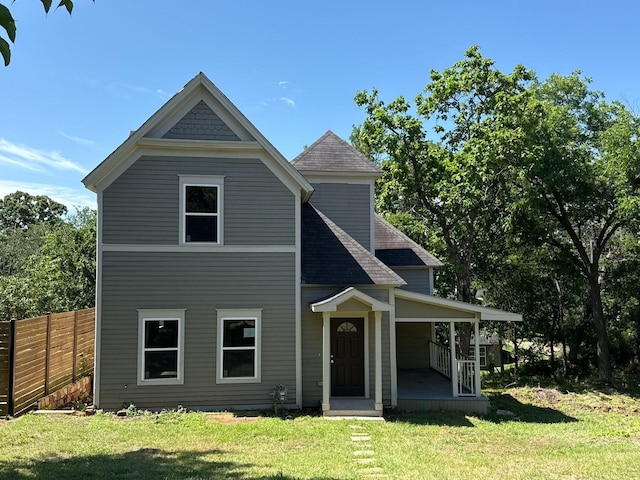 1510 W Woodard St, Denison, TX 75020 - view of front of house with roof with shingles and a porch