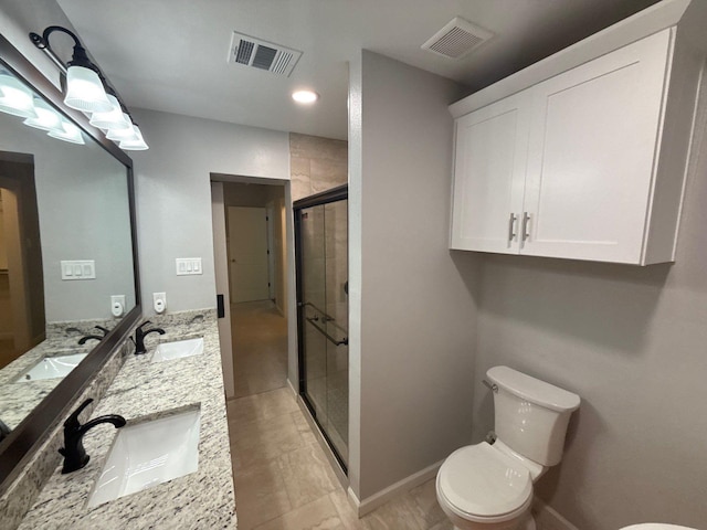 1510 W Woodard St, Denison, TX 75020 - bathroom featuring a stall shower and double vanity