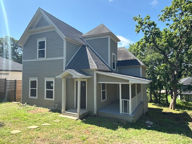1510 W Woodard St, Denison, TX 75020 - back of property with a shingled roof
