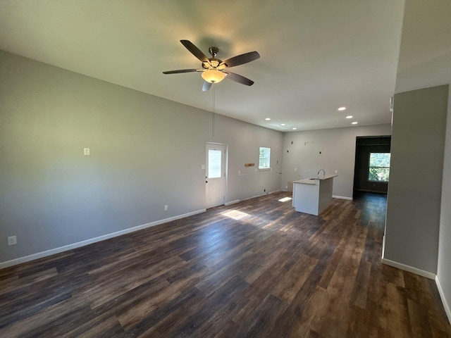 1510 W Woodard St, Denison, TX 75020 - unfurnished living room featuring plenty of natural light, dark wood-style flooring, recessed lighting, and a ceiling fan