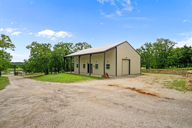 101 Goldfinch Ln, Weatherford, TX 76088 - view of outdoor structure featuring driveway
