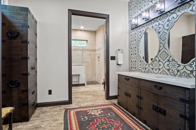 101 Goldfinch Ln, Weatherford, TX 76088 - bathroom featuring double vanity and a tile shower