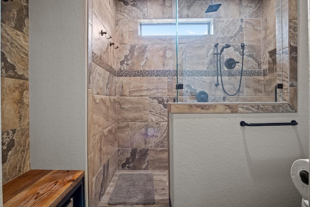 101 Goldfinch Ln, Weatherford, TX 76088 - bathroom with walk in shower and a textured wall